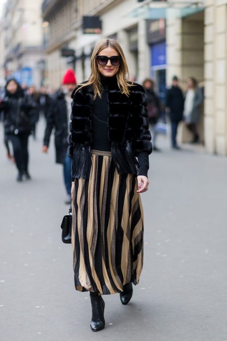 Olivia Palermo wearing black pants and blouse seen outside Elie