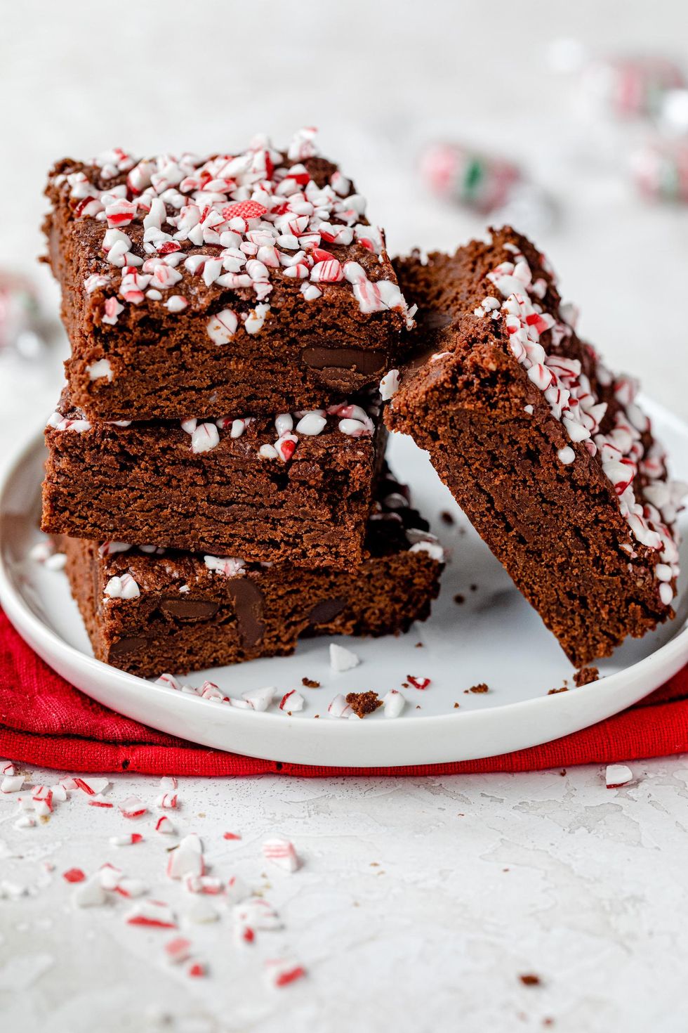 peppermint brownies on a white plate and red napkin