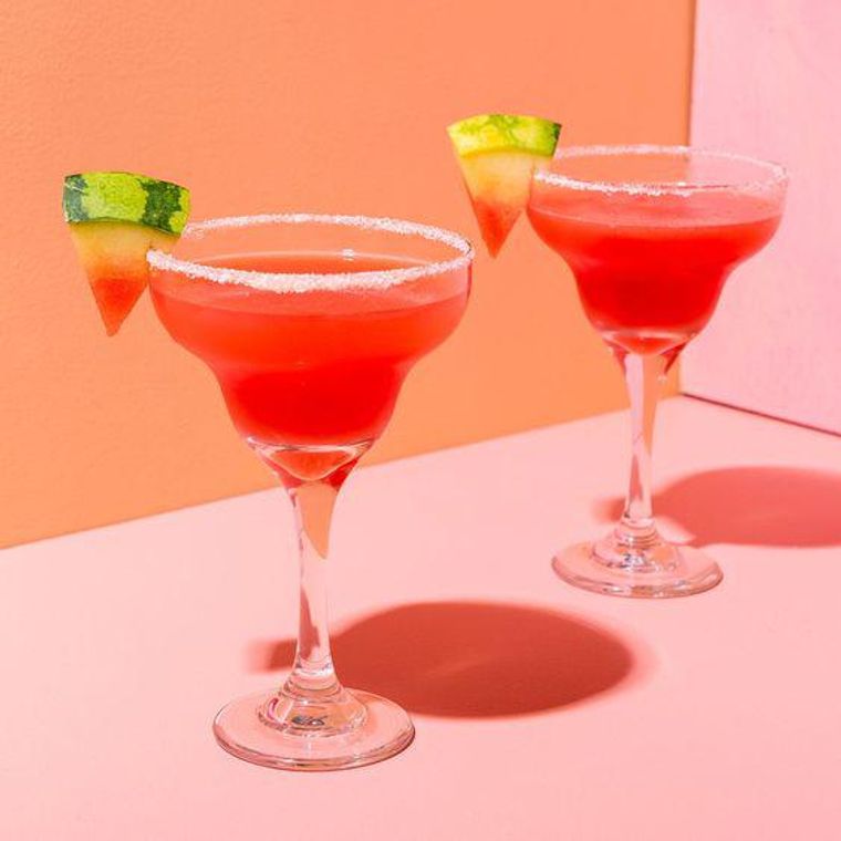 https://www.brit.co/media-library/pink-watermelon-margaritas-in-a-martini-glass-on-a-pink-table.jpg?id=27007737&width=760&quality=90