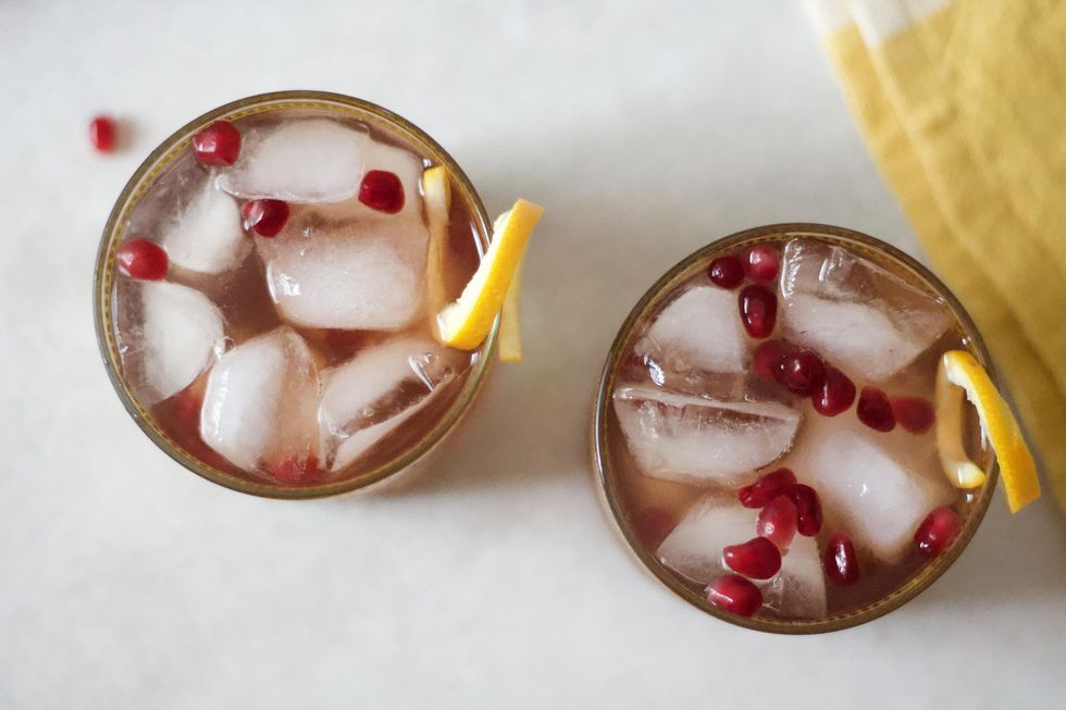 pomegranate ginger beer cocktail with orange peel