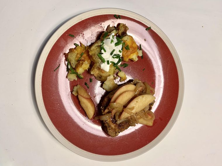 https://www.brit.co/media-library/pork-chops-with-sweet-onions-apple-and-cheesy-crushed-loaded-potatoes.jpg?id=31880529&width=760&quality=90