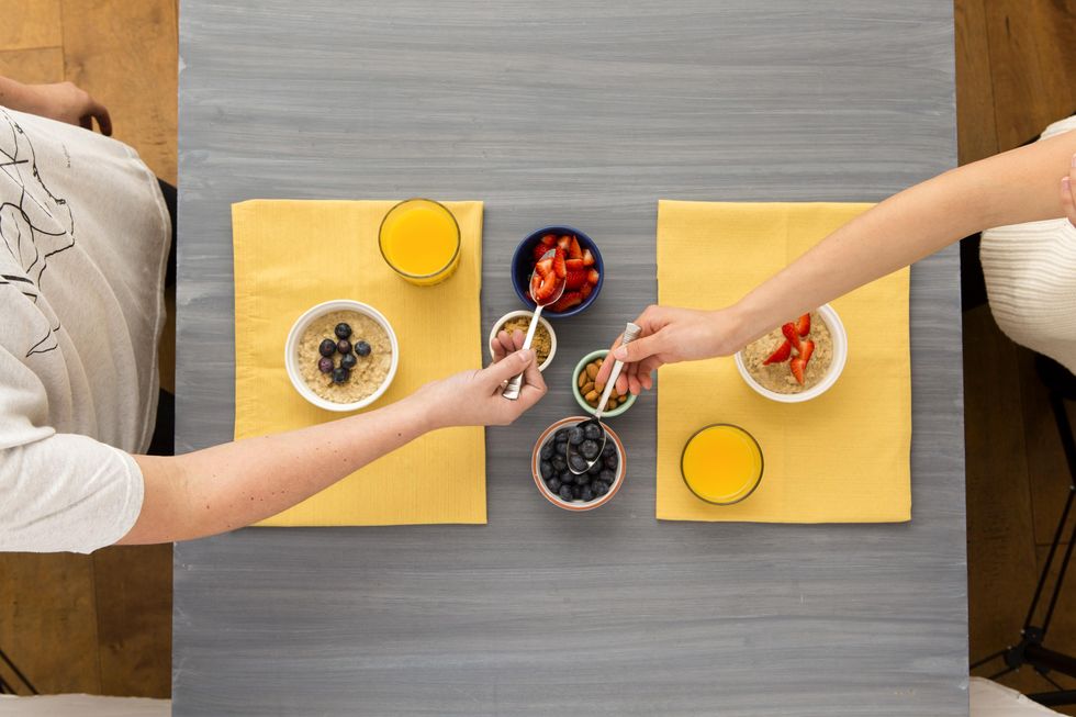 putting berries on oatmeal