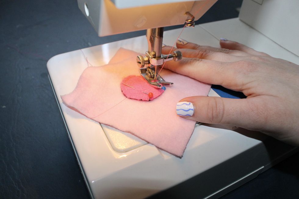 sewing the circle onto the fleece