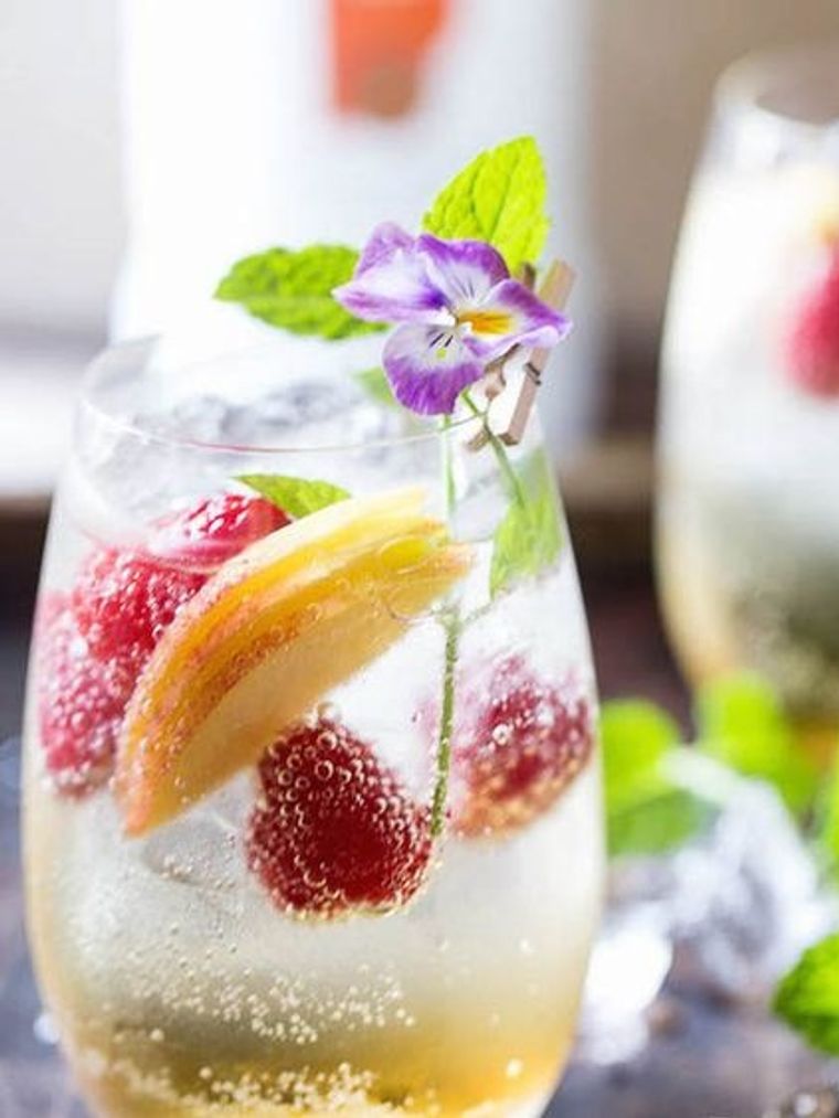 https://www.brit.co/media-library/sparkling-champagne-spritzer-with-peaches.jpg?id=23586005&width=760&height=1012&quality=90&coordinates=0%2C0%2C141%2C0