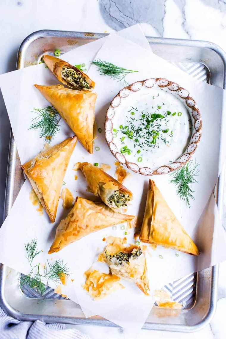 https://www.brit.co/media-library/spinach-and-feta-triangles-finger-foods.jpg?id=50634774&width=760&quality=90