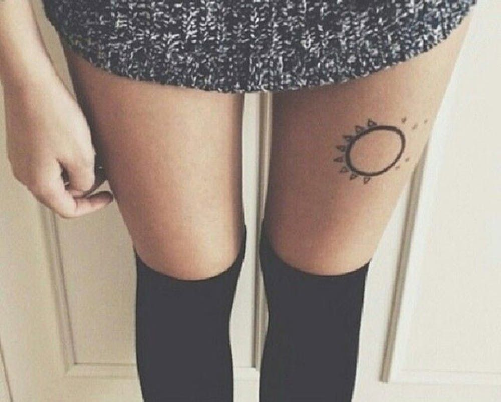 12 Pretty and Meaningful Thigh Tattoos - Brit + Co