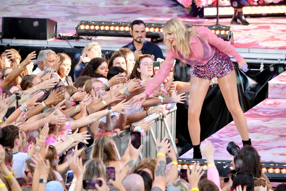 taylor swift performing during the lover era in new york city Who is Scooter Braun