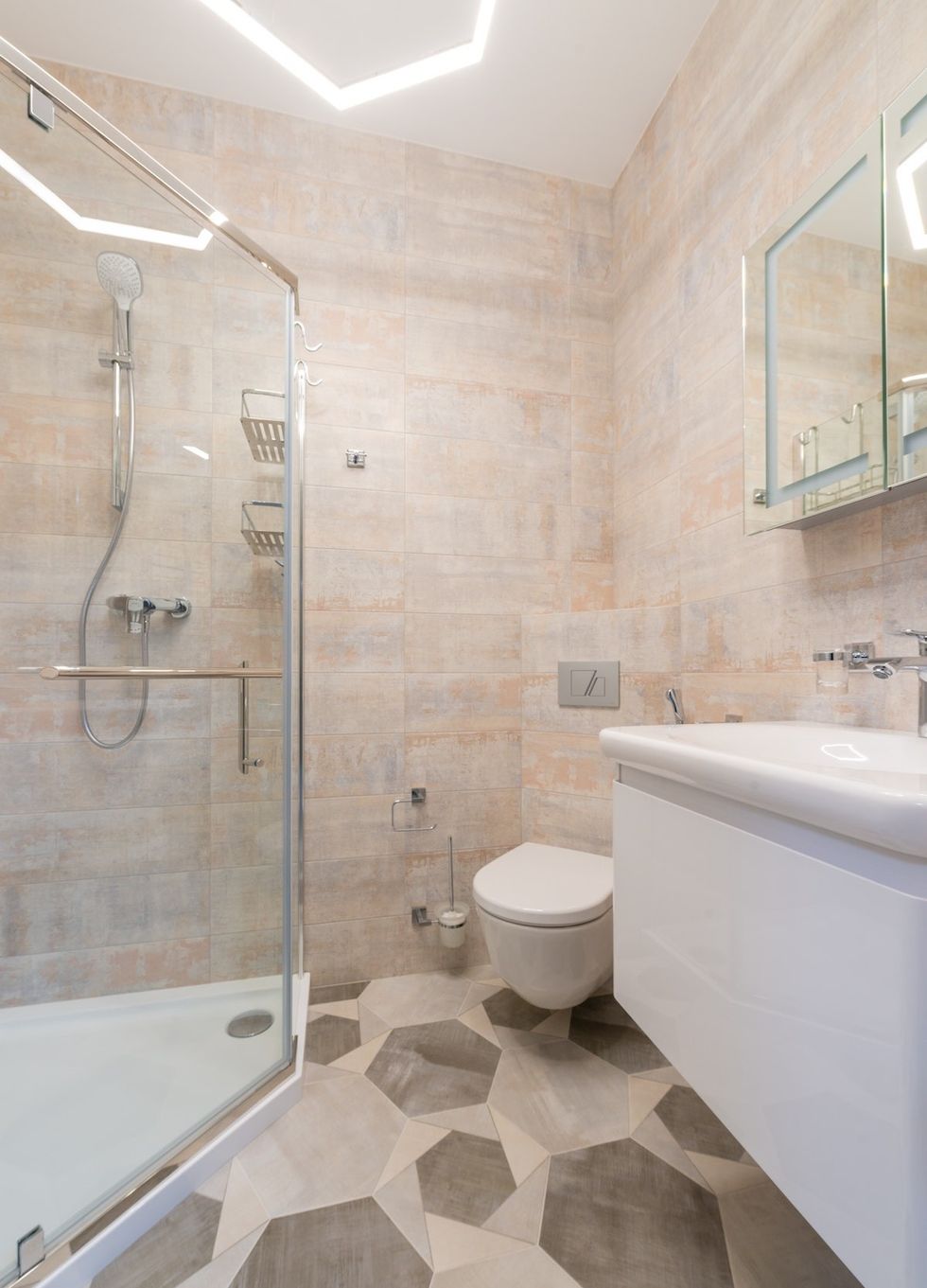 toilet and shower in a neutral bathroom