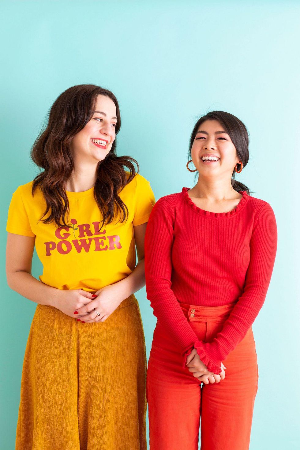 two friends laughing together on Random Acts of Kindness Day