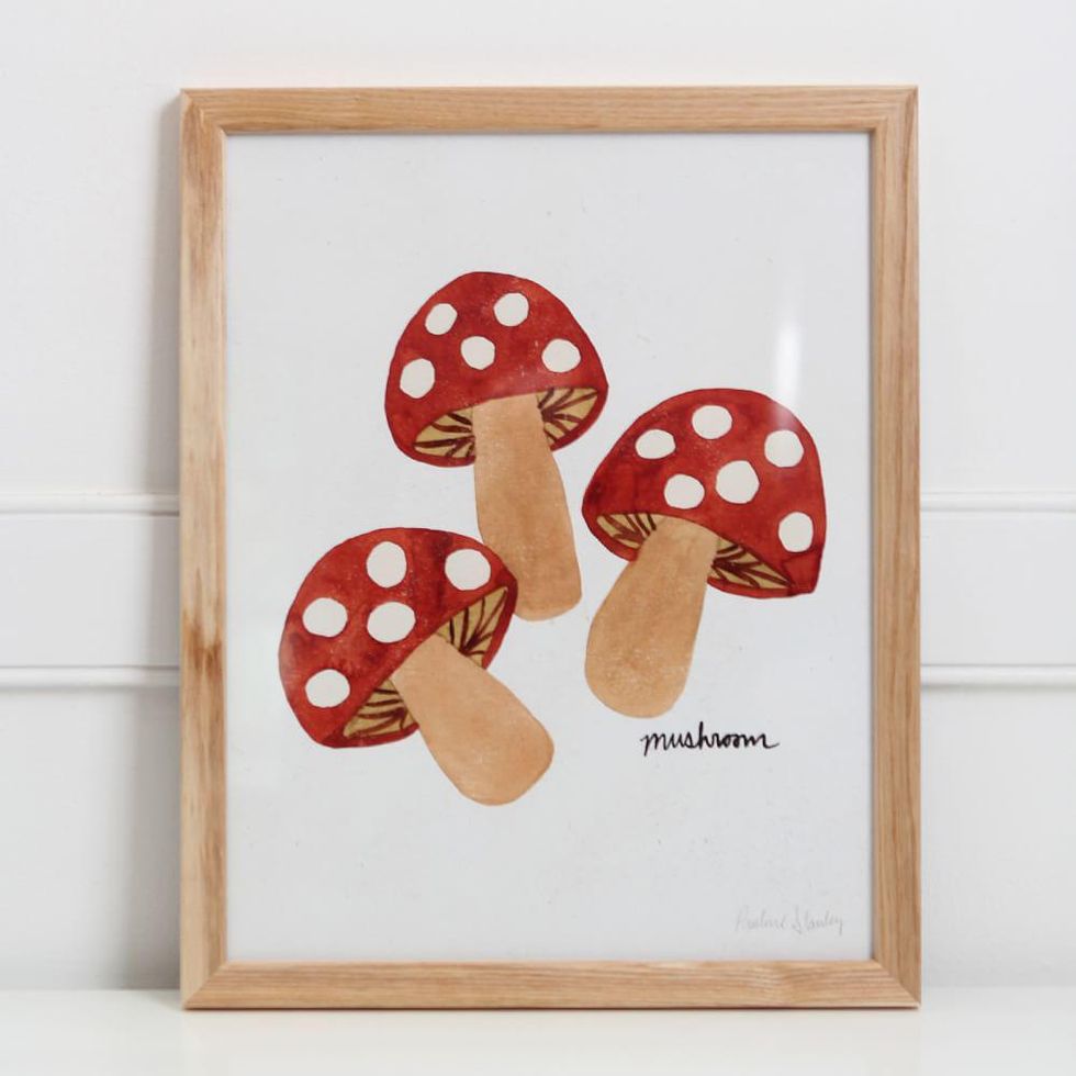 white and red mushroom wall art