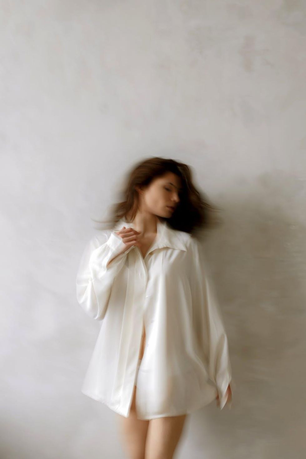 woman in a white blouse