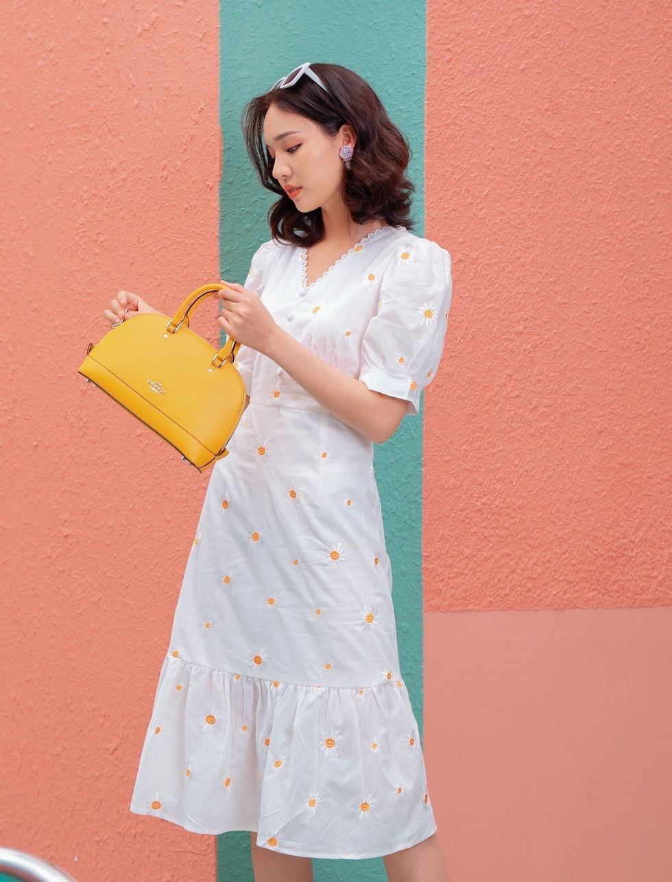 woman in white floral dress