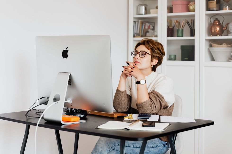 woman looking at computer screen