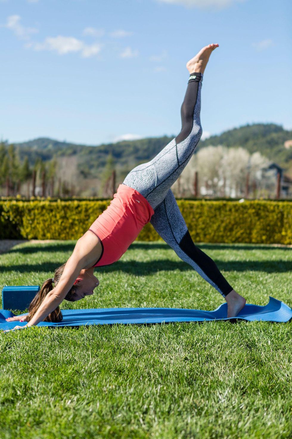 woman practicing yoga outside