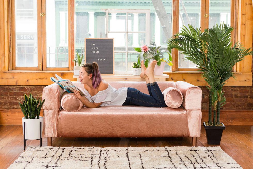 woman reading a book enjoying alone time