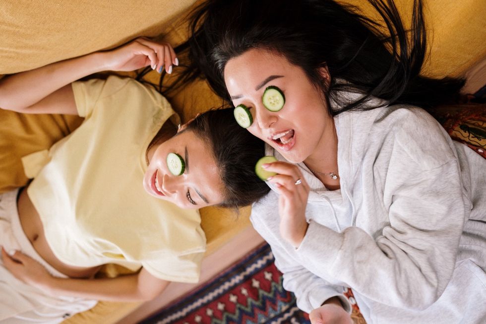 Women having self-care night on couch