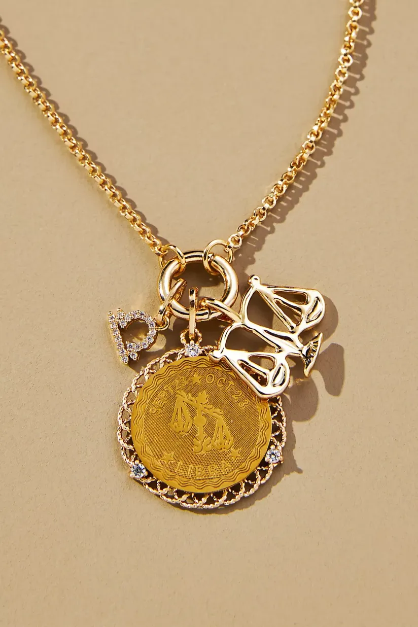 https://www.brit.co/media-library/zodiac-charm-necklace.webp?id=50448234&width=824&quality=90